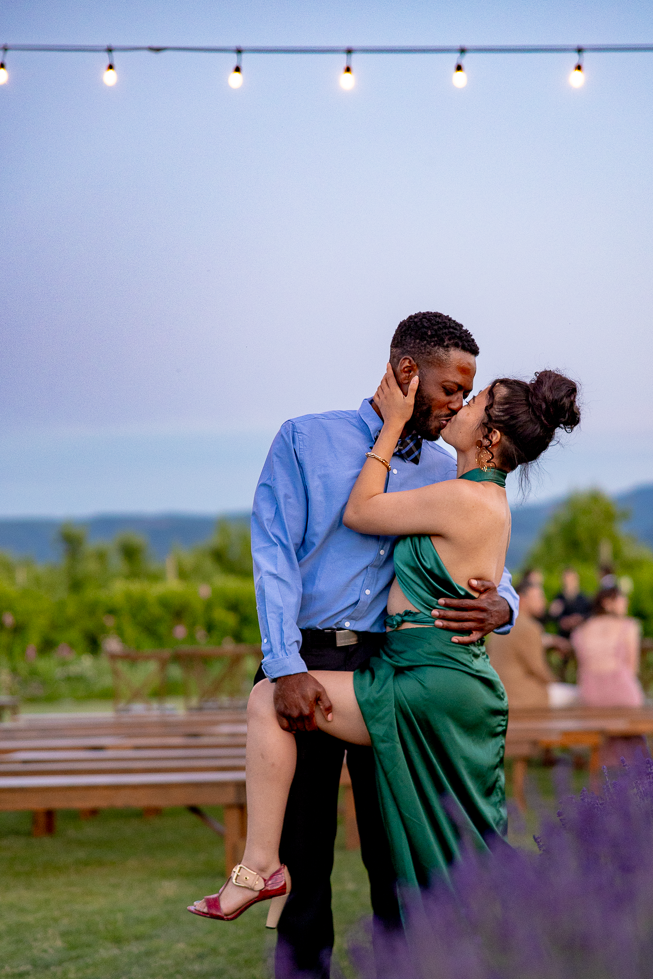 Couple dancing at an outdoor evening event